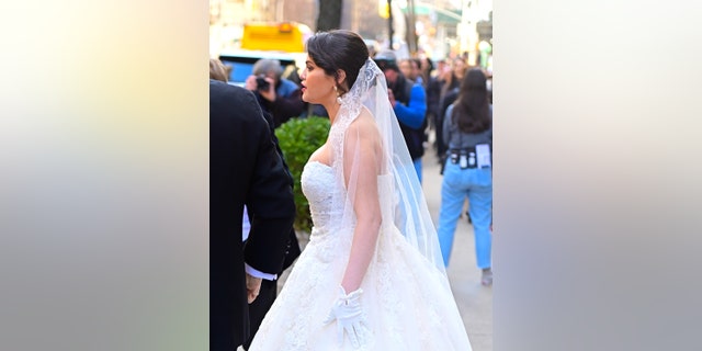 Gomez wore full wedding attire while filming scenes for the Hulu series.