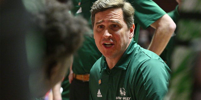 Head coach Mark Madsen of the Utah Valley Wolverines talks to his team before their first round game against the New Mexico Lobos in the 2023 National Invitation Tournament at The Pit on March 15, 2023 in Albuquerque, New Mexico.