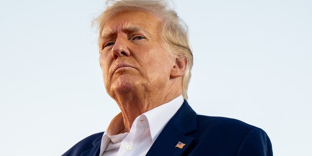 Former President Donald Trump looks on during a rally at the Waco Regional Airport on March 25, 2023, in Waco, Texas.