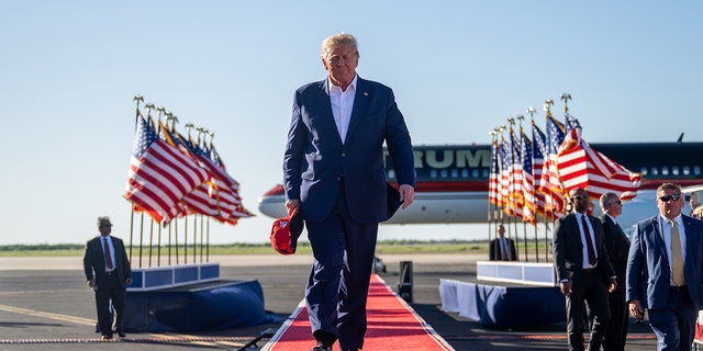 Former President Trump seen arriving on March 25, 2023, to his first rally since announcing his 2024 presidential candidacy in Waco, Texas. He is facing possible criminal indictments in New York and Georgia.