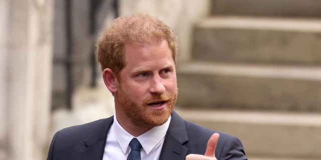 Prince Harry gives a thumbs up outside the Royal Courts of Justice on March 27, 2023 in London, England.