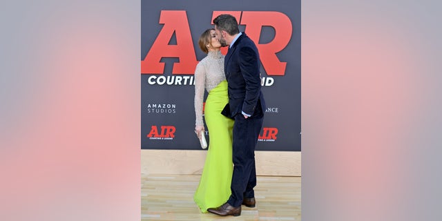 Jennifer Lopez and Ben Affleck shared a PDA moment on the red carpet at the premiere of "Air" Monday night.