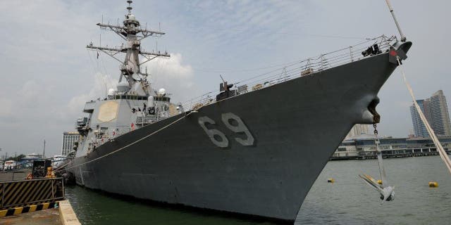 A general view shows the USS Milius (DDG-69), a multi-mission capable guided missile destroyer ship docked at the Manila South Harbor.