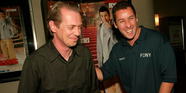 Steve Buscemi jokes around with Adam Sandler at the "Mr. Deeds" world premiere at Loews Lincoln Center in New York City. June 18, 2002. 