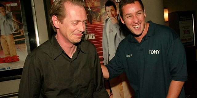 Steve Buscemi jokes around with Adam Sandler at the "Mr. Deeds" world premiere at Loews Lincoln Center in New York City. June 18, 2002. 