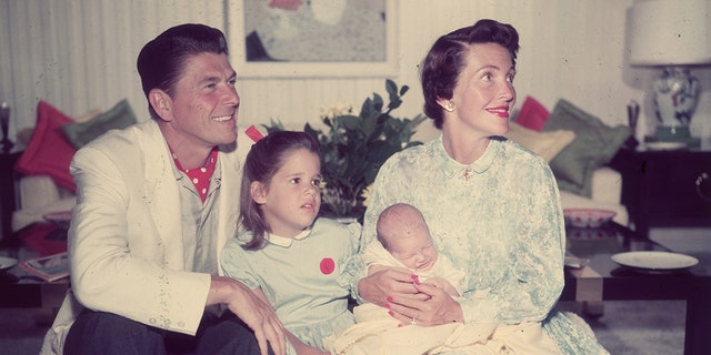 Shown above, Ronald and Nancy Reagan, their daughter Patti and their infant son, Ron Jr. 