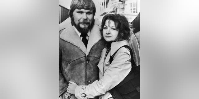 George and Kathy Lutz, former owners of the house at 112 Ocean Ave. in Amityville, New York, pose during a press tour for the book, "The Amityville Horror," in London on Jan. 11, 1979.