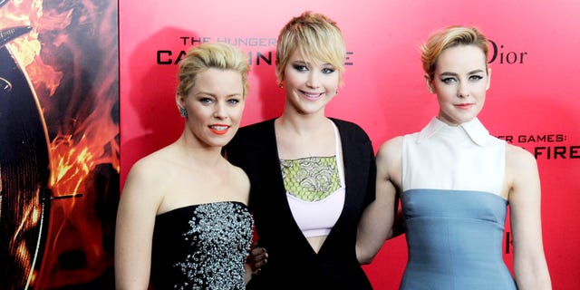 Elizabeth Banks, Jennifer Lawrence and Jena Malone attend the "Hunger Games: Catching Fire" New York premiere at AMC Lincoln Square Theater on Nov. 20, 2013.