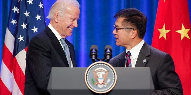 BEIJING, CHINA - DECEMBER 05: U.S Vice President Joe Biden (L) shake hands with U.S. ambassador to China Gary Locke (R) during his business leader breakfast at the The St. Regis Beijing hotel on December 5, 2013 in Beijing, China. U.S Vice President Joe Biden will pay an official visit to China from December 4 to 5.