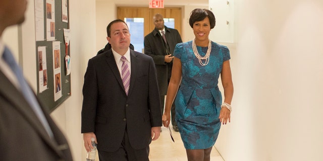 Mayor Muriel Bowser, seen accompanied by John Falcicchio in 2015 following her election to office, announced an investigation into her former adviser.