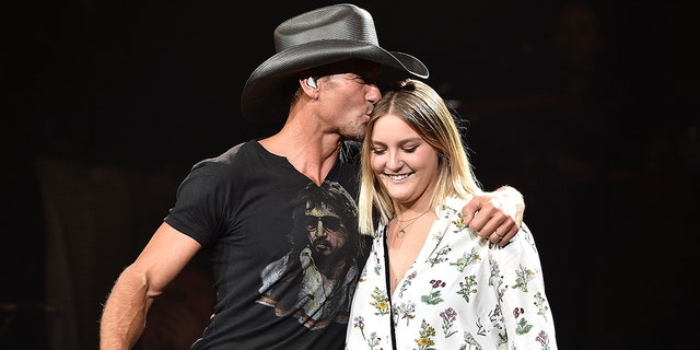 Tim McGraw plays with his daughter Gracie McGraw in Nashville.