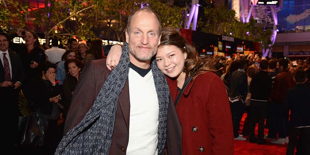 Woody Harrelson with his daughter Zoe in 2015. Harrelson admitted his kids help keep him grounded.