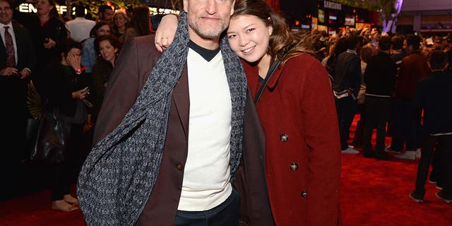 Woody Harrelson with his daughter Zoe in 2015. Harrelson admitted his kids help keep him grounded.