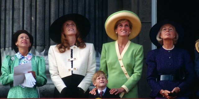 Princess Margaret, Sarah Ferguson, Prince Harry, Diana and Katharine, Duchess of Kent stand on the balcony of Buckingham Palace in 1990.