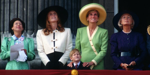 Princess Margaret, Sarah Ferguson, Prince Harry, Diana and Katharine, Duchess of Kent stand on the balcony of Buckingham Palace in 1990.