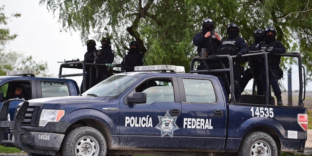 The Federal police escort travelers crossing the dangerous highway of the gang-infested northeastern state of Tamaulipas, from the border with the United States on December 16, 2015.