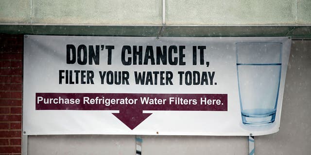 A sign warns residents to filter their water on Jan. 17, 2016, in Flint, Michigan.