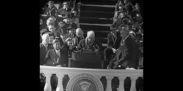 Poet Robert Frost (center) reads one of his poems during John F. Kennedy's inauguration ceremony at the Capitol in Washington, D.C., on Jan. 20, 1961.