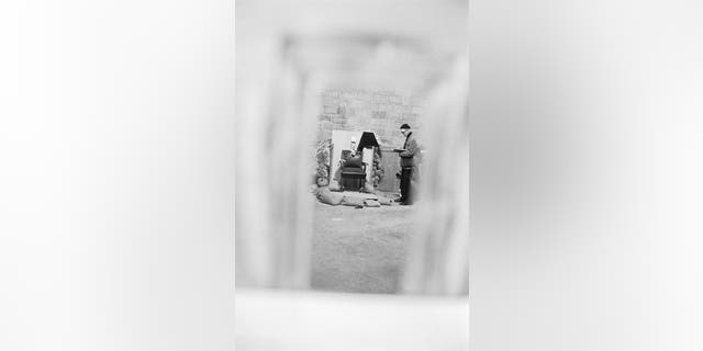 Point of the Mountain, Utah: An executioner's view through the canvas screen that shielded the firing squad from Gary Gilmore. Five riflemen fired four bullets through the slits in the screen at Gilmore, who sat in the chair viewed through the screen.