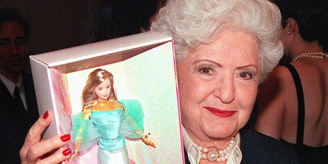 Ruth Handler, Mattel Inc. co-founder and inventor of the Barbie doll, is shown displaying the special 40th anniversary Barbie at a 1999 press conference in New York City. 