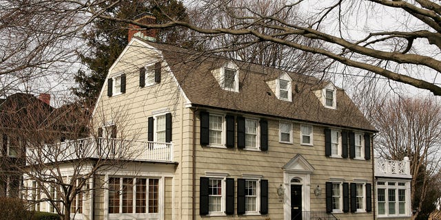 The "Amityville Horror" house is shown at 112 Ocean Ave. in Amityville, New York, on March 31, 2005. A man killed his family there in 1974.
