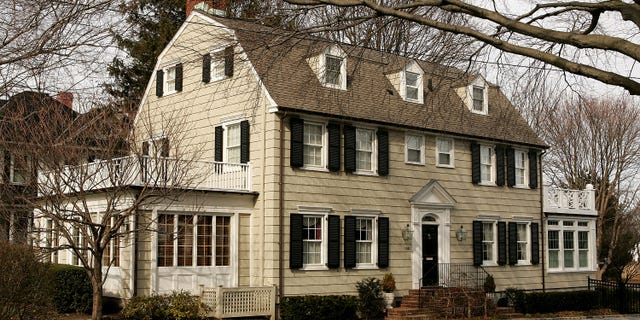 The "Amityville Horror" house is shown at 112 Ocean Ave. in Amityville, New York, on March 31, 2005. A man killed his family there in 1974.