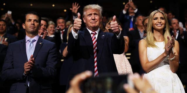 Then-presidential campaigner  Donald Trump gives 2  thumbs up   arsenic  Donald Trump Jr. and Ivanka Trump basal   and cheer for Eric Trump arsenic  helium  delivers a code   during the Republican National Convention.