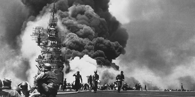 The USS Bunker Hill was hit by kamikaze pilots during the Battle of Okinawa, Japan, in 1945.