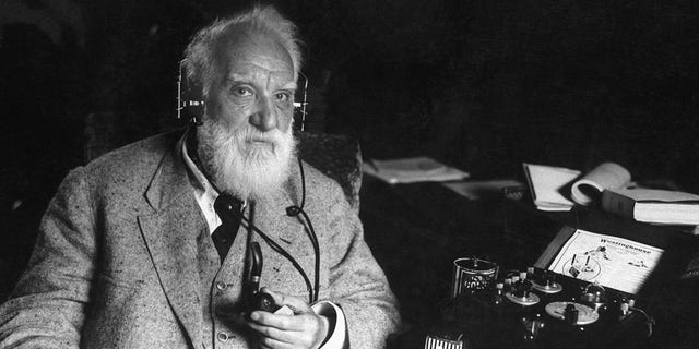 American inventor Alexander Graham Bell (1847-1922) with one of his inventions, circa 1910. Bell engineered the first intelligible electronic transmission of voice and patented the telephone, and was a founding member and president of the National Geographic Society. 