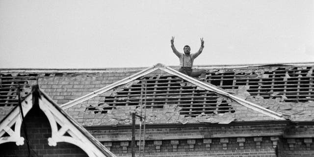 Michael Peterson, aka Charles Bronson, stages a protest on the roof of Broadmoor Hospital June 20, 1983.