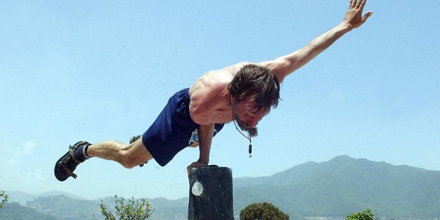 Dutchman Wim Hof, better known as "the Iceman" for his ability to withstand seemingly impossible levels of cold, demonstrates skills at a hotel in Kathmandu in May 2007.