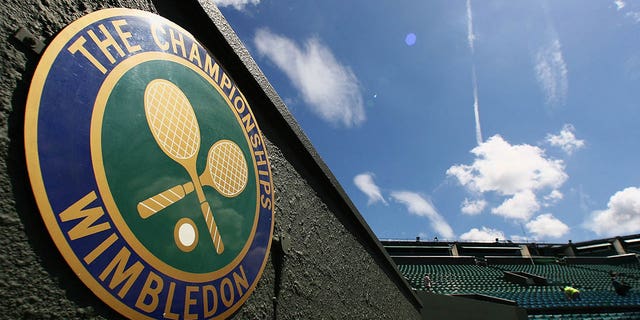  A 'The Championships' logo is seen astatine  Centre Court during previews for the Wimbledon Lawn Tennis Championships astatine  the All England Lawn Tennis and Croquet Club connected  June 21, 2007, successful  London, England. 