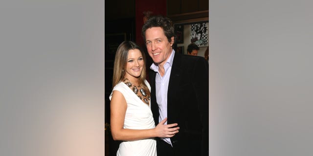 Drew Barrymore and Hugh Grant at the "Music and Lyrics" New York City Premiere.