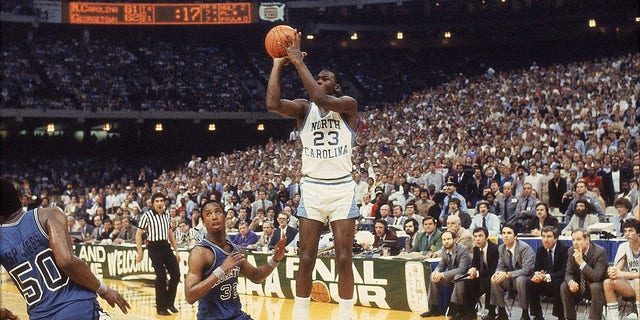 NCAA Final Four, North Carolina's Michael Jordan (No. 23) in action makes the game-winning shot against Georgetown, in New Orleans, March 29, 1982. 