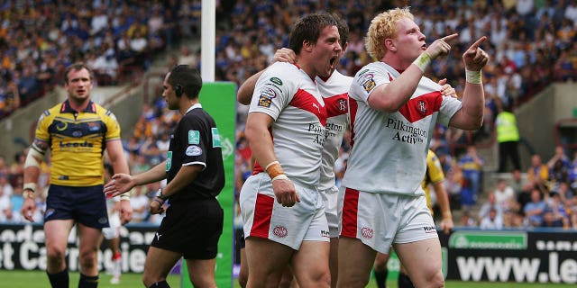 Bryn Hargreaves of St. Helens celebrates his try with team mate James Graham (R) during the Carnegie Challenge Cup Semi Final match between Leeds Rhinos and St.Helens at the Galpharm Stadium on July 26, 2008 in Huddersfield, England.