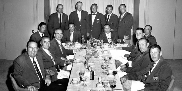 From left to right, Claude Harmon, Gene Sarazen, Clifford Roberts, Cary Middlecoff, Sam Snead, Doug Ford, Byron Nelson, Jimmy Demaret, Bobby Jones, Jack Burke, Jr., Craig Wood, Ben Hogan, Horton Smith, Herman Keizer, and Henry Picard attends the Masters Dinner during the 1958 Masters Tournament at the Augusta National Golf Club, held April 3-6, 1958 in Augusta, Georgia.