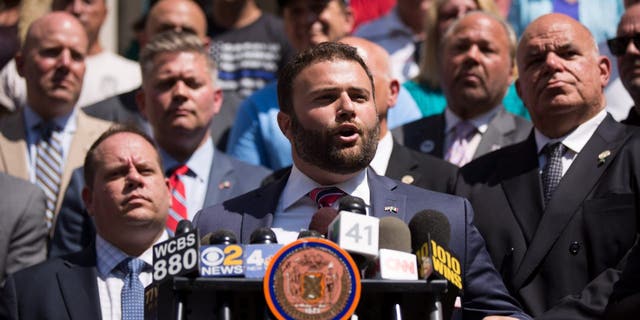 New York City council member Joe Borelli, a Republican from Staten Island, speaks outside of City Hall during a press conference and rally in support of the Christopher Columbus statue in Manhattan, August 24, 2017 in New York City.