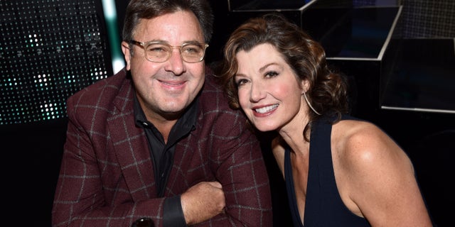 Amy Grant says she discovered her heart condition on a routine doctor's visit for her husband, Vince Gill.