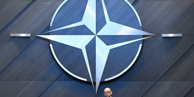 The NATO logo is pictured inside the new North Atlantic Council meeting room at the new NATO headquarters during a press tour of the facilities.