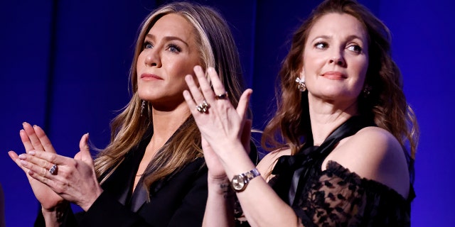 'Three's Company' star Suzanne Somers 'would be honored' to have Jennifer Aniston play Chrissy Snow 2 "You're much more Chrissy," Drew Barrymore (right) told Jennifer Aniston (left).