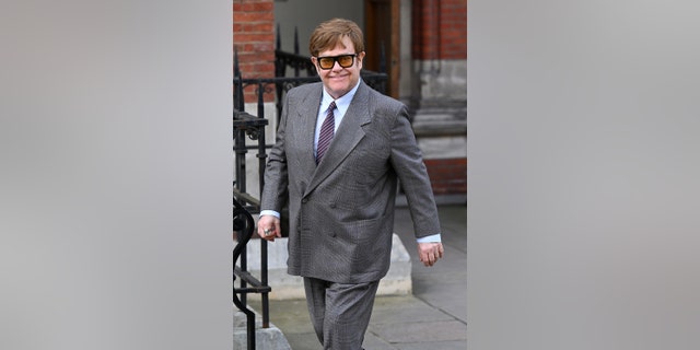 Sir Elton John departs the Royal Courts of Justice in his role as claimant after attending a lawsuit against the Associated Newspapers on March 27, 2023, in London.