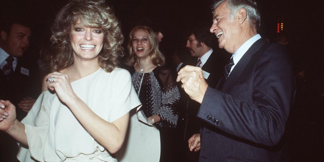 Farrah Fawcett dancing with her father, circa 1978.
