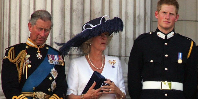 In "Spare," Prince Harry, right, wrote candidly about members of the British royal family, including his stepmother Camilla, center.