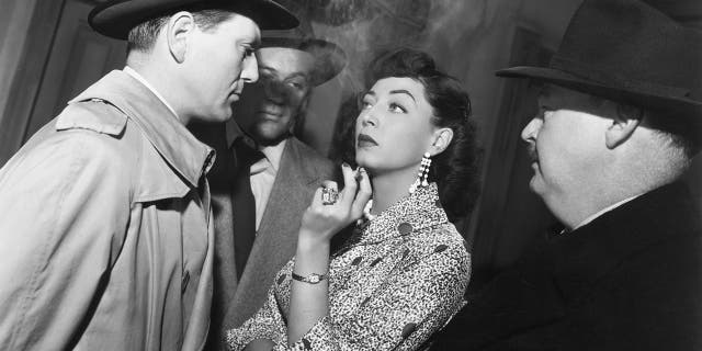 Charles McGraw, left, Marie Windsor and Don Beddoe in a scene from director Richard Fleischer's 1952 film "The Narrow Margin."