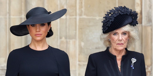 Camilla, Queen Consort, right, seen next to Meghan, Duchess of Sussex during Queen Elizabeth II's funeral in September, has been described as "the apparent new power player at Buckingham Palace."
