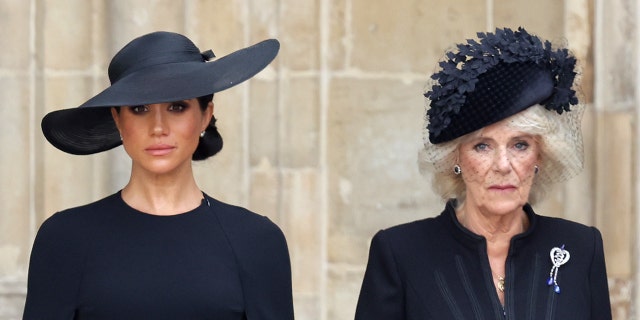 Camilla, Queen Consort, right, seen next to Meghan, Duchess of Sussex during Queen Elizabeth II's funeral in September, has been described as "the apparent new power player at Buckingham Palace."