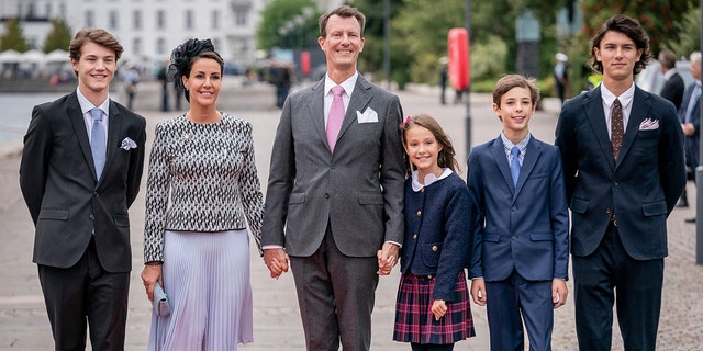 From left: Prince Felix, Princess Marie, Prince Joachim, Princess Athena, Prince Henrik and Prince Nikolai arrive for a luncheon on the Dannebrog Royal Yacht, in Copenhagen, on September 11, 2022, during the 50th anniversary of Queen Margrethe II of Denmark's accession to the throne. 