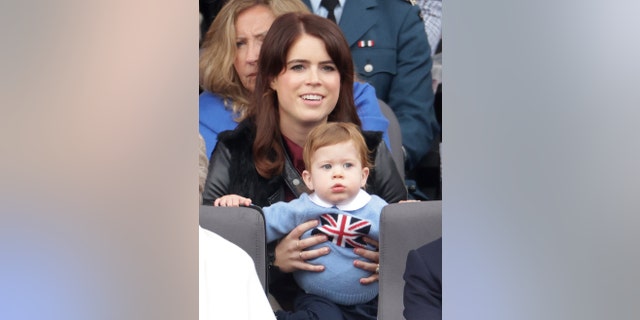 Princess Eugenie holds son August Brooksbank as they watch the Platinum Jubilee Pageant from the Royal Box June 5, 2022, in London.