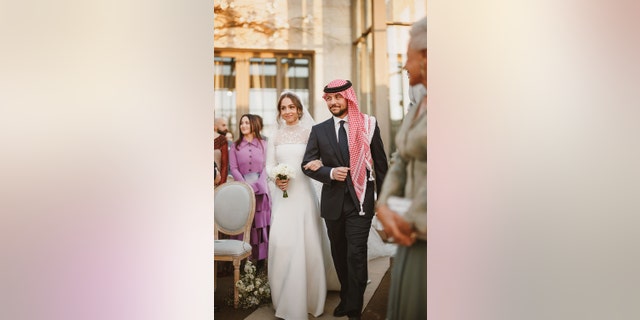 Princess Iman was seen beaming alongside her brother Crown Prince Hussein.