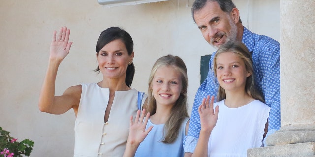 In this 2019 photo, King Felipe VI is seen with his wife, Queen Letizia, and their daughters, from left, Princess Leonor and Princess Sofia at Palma de Mallorca, Spain.